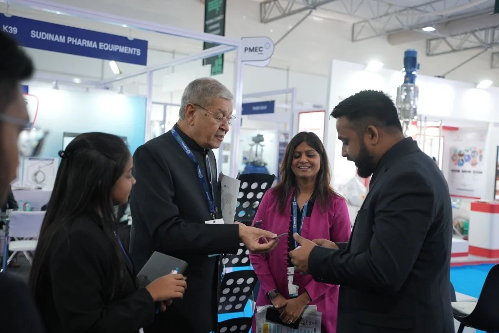 M19 team meeting with pharma partners at an industry exhibition